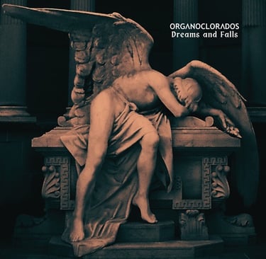 a statue of a angel with wings on a bench