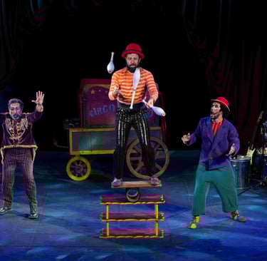 a man in a clown costume standing on a stage