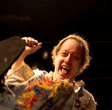 a man holding a knife and knife in his hand