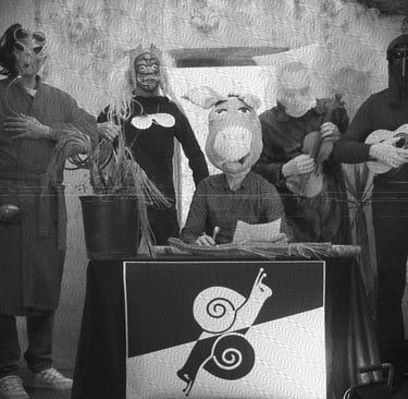 a group of people standing around a table with a guitar