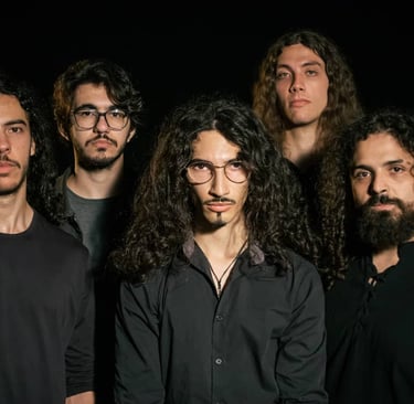 a group of men with long hair and beards