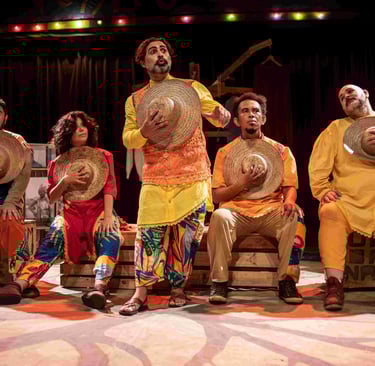 a group of people sitting on a stage