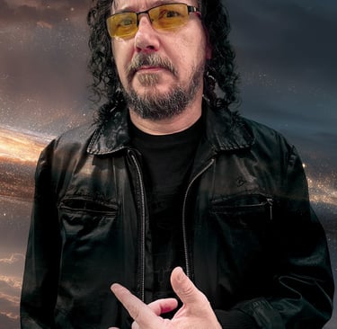 Portrait of a man with curly hair and a leather jacket making a hand gesture against a cosmic space background.