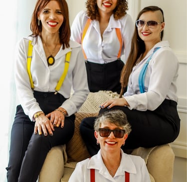 a group of women sitting on a couch