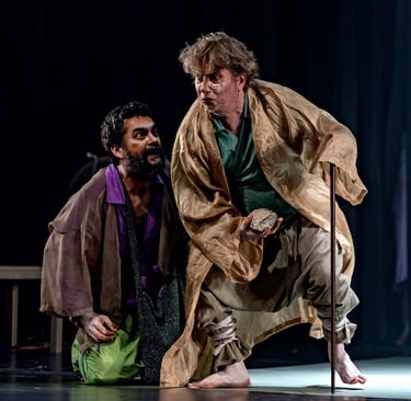a man in a robe and a man in a robe