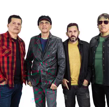 Four male band members in casual rock attire posing against a white background.