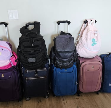 Carry-on bags packed for 3 weeks in Europe with kids.