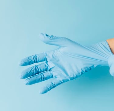 a person wearing gloves and gloves with a glove on their hands