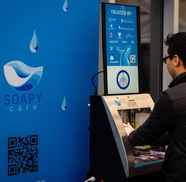 a man standing in front of a screen with a barcoder