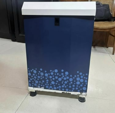a blue and white box with blue dots on it