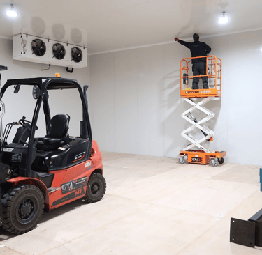 Installation team in the freezer room in London