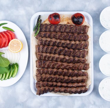 a plate of meat and vegetables on a table