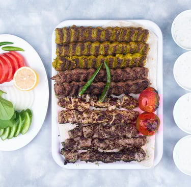 a plate of meat and vegetables on a table