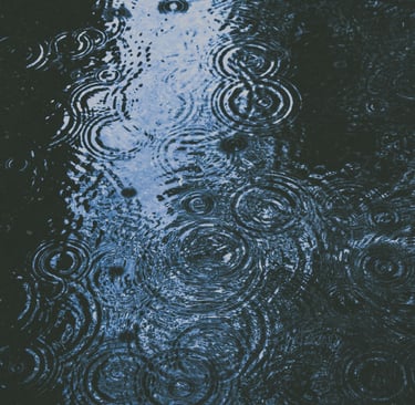 Puddle with ripples during the rain