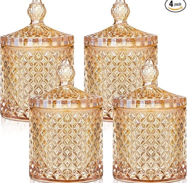 Set of four amber glass jars with lids featuring a vintage diamond-cut design