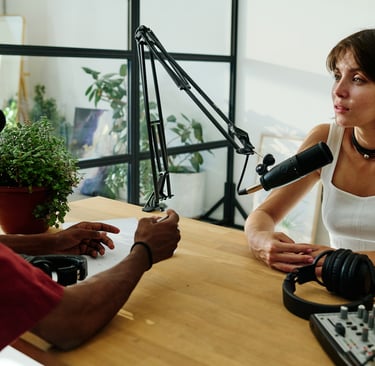 A podcaster interviewing a guest