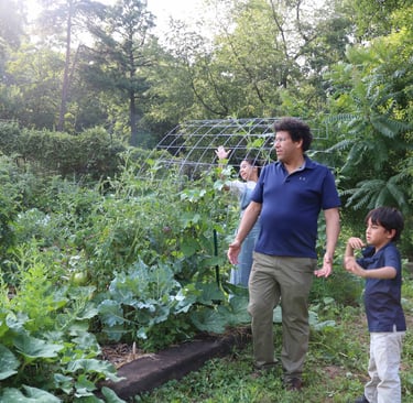 Dave and the kids in the garden. 