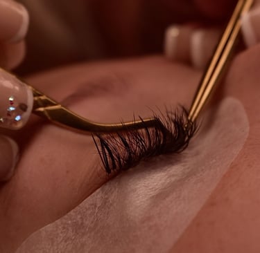 Adding lash extensions on a client