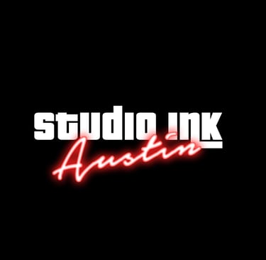 a studio with a neon sign that says studio ink