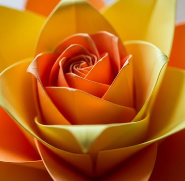a close up of a flower in a vase