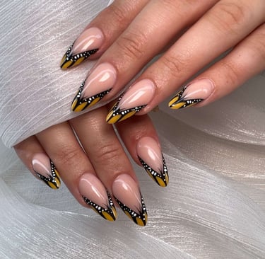 Square fall nails with orange leaf art, gold glitter ombre, and plaid accent designs.