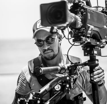 Jonathan Calero operating steadicam in black and white