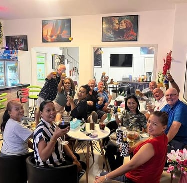 a group of people sitting around a table