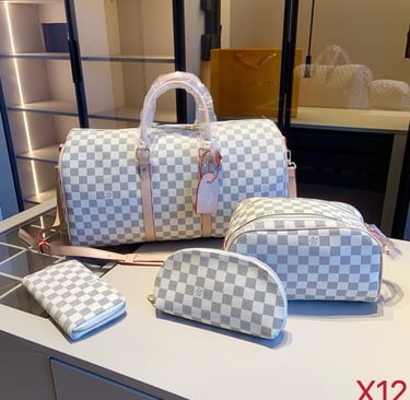 a set of three pieces of luggage bags