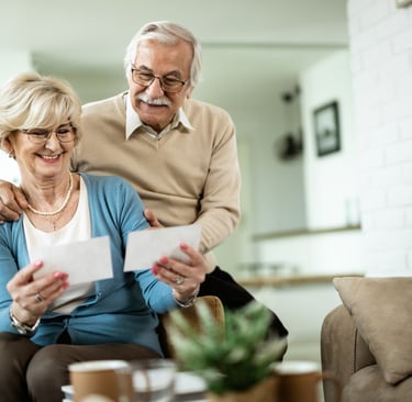 a man and woman sitting on a couch