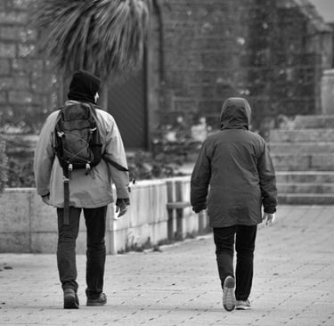 Two people walking together representing companionship through grief.