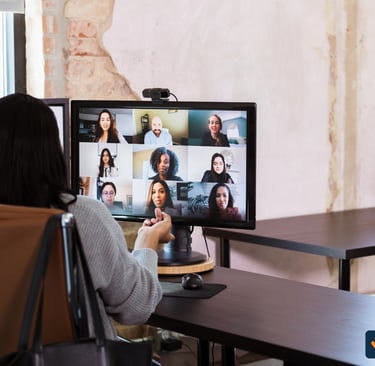 Western manager and a Filipino team member collaborating during a virtual meeting
