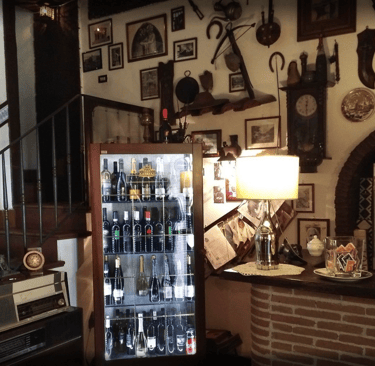 a refrigerator with a glass door and a glass door