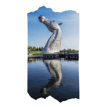 a large horse statue of a horse head reflecting in the water