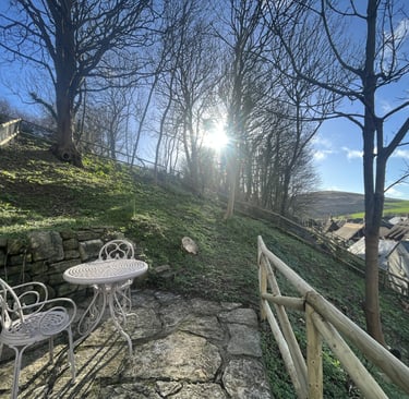 a beautiful garden overlooking west lulworth village