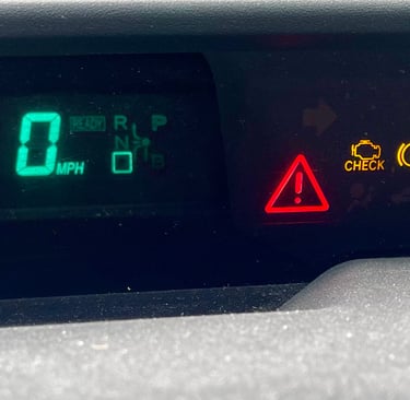 Prius hybrid battery trouble warning light red triangle of death GoGoHybridBattery.com 