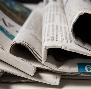 Imagem de jornal impresso dobrado