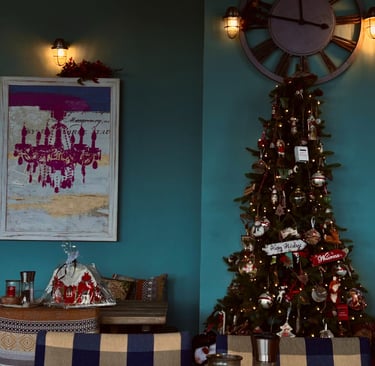 a christmas tree with a clock on the wall