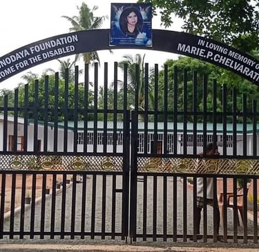 a gated entrance to a building with a sign that says,'welcome to