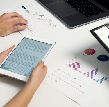 ipad and graphs on table
