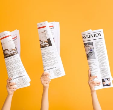 three hands holding up newspapers and a newspaper-digital marketing institution