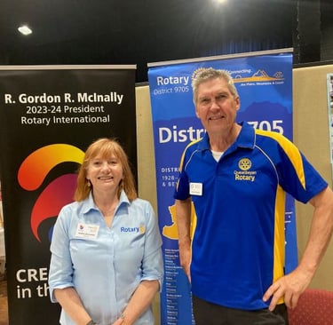 RCQ Volunteers Andrea and Steve ready to talk to possible new members