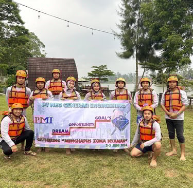 a group of people in life jackets and life jackets standing in front of a banner