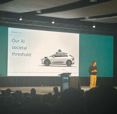 a man standing in front of a presentation screen