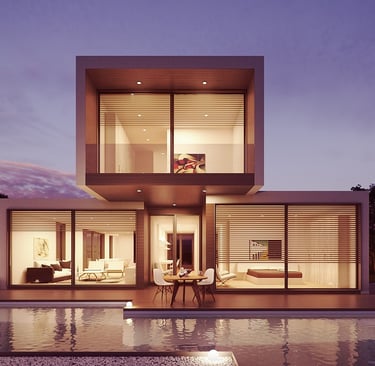 A unique modular vacation rental with a pool, a sunset in the background.