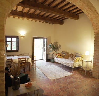 a living room with a couch and an arc