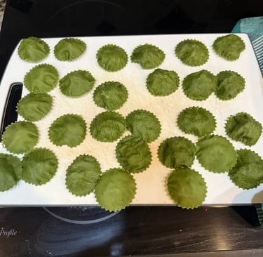 fresh handmade spinach ravioli before cooking