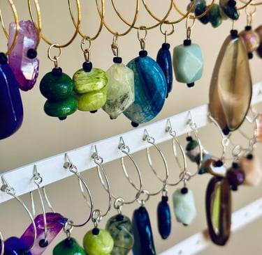 assorted gorgeous wine charms in many colors