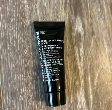 Peter Thomas Roth Instant FirmX Eye Tightener on vanity counter.