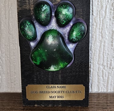 Resin dog show trophy on hardwood base with 3 lines of engraving