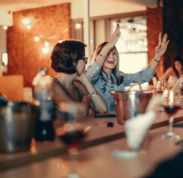 Happy Restaurant customers enjoying a meal.